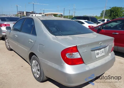 2002 Toyota Camry Le from USA, damaged, VIN 4T1BE32K02U039849